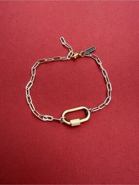 Gold Tone Link Bracelet with Oval Lock Accent
